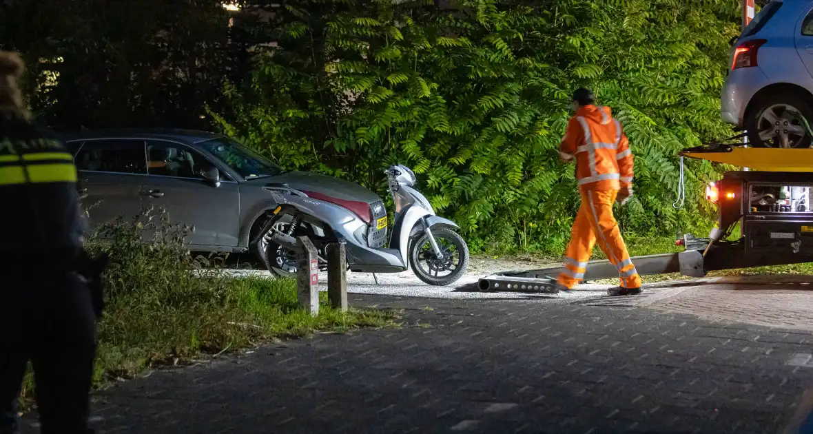 Politie neemt scooter in beslag tijdens onderzoek in woning - Foto 4