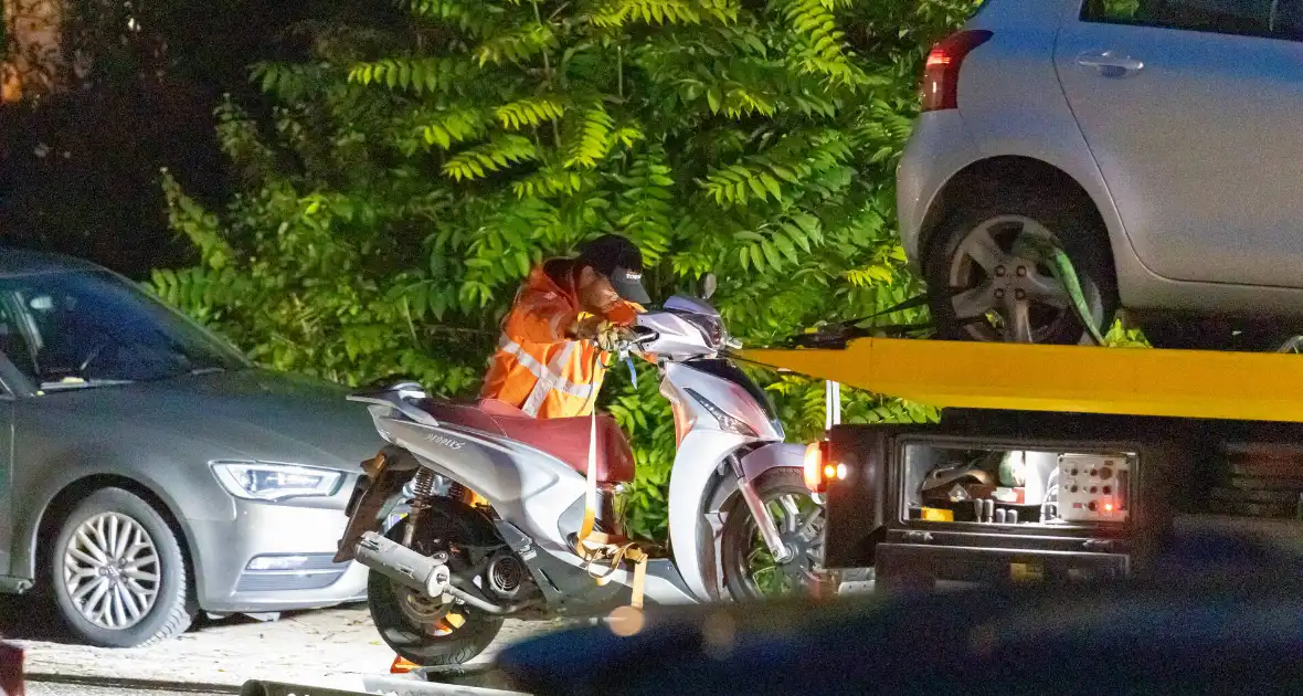 Politie neemt scooter in beslag tijdens onderzoek in woning - Foto 6