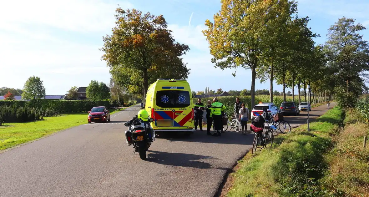 Twee fietsers klappen op elkaar