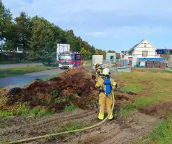 Fikse rookontwikkeling bij brand in maaiafval