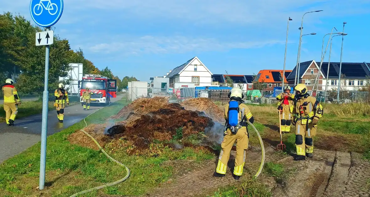 Fikse rookontwikkeling bij brand in maaiafval - Foto 1