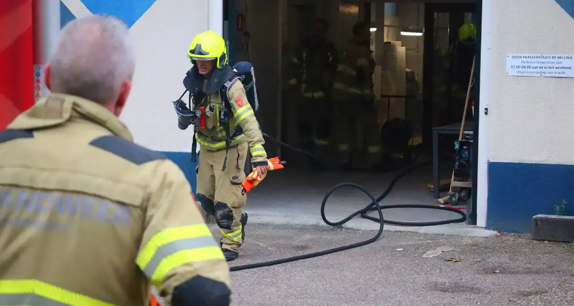 Brand in werkplaats snel onder controle - Foto 1