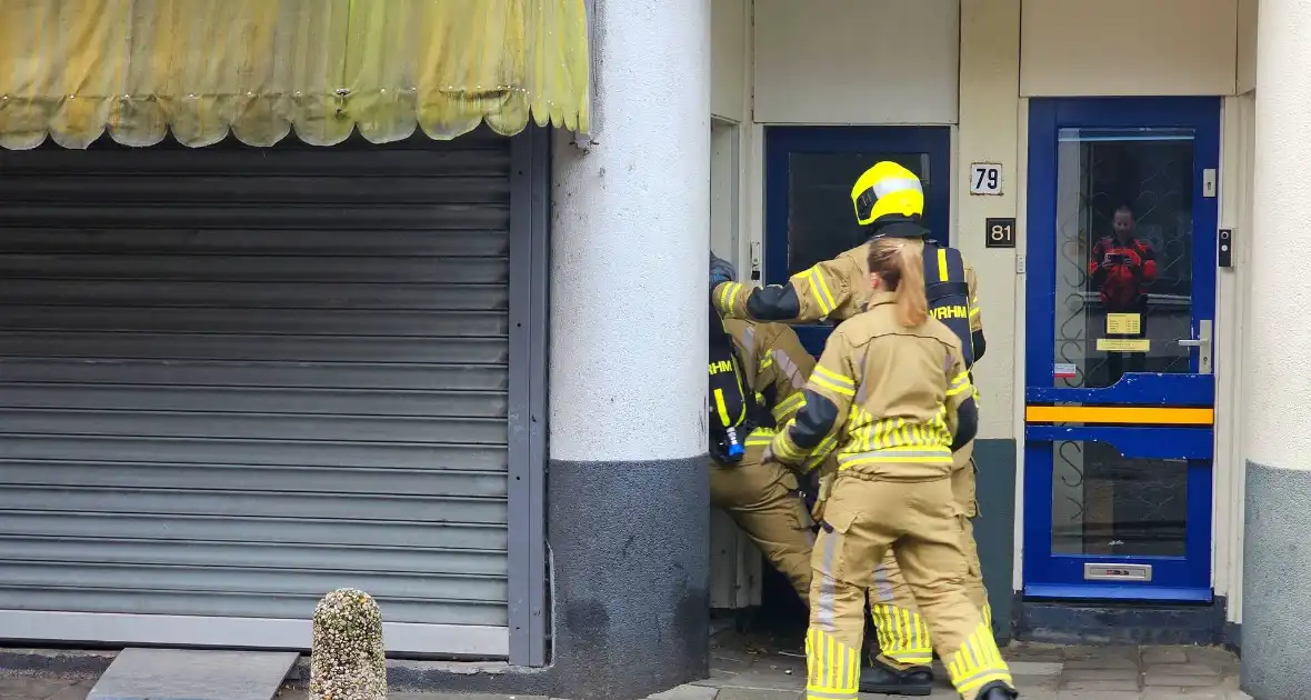 Brandweer forceert deur supermarkt - Foto 4