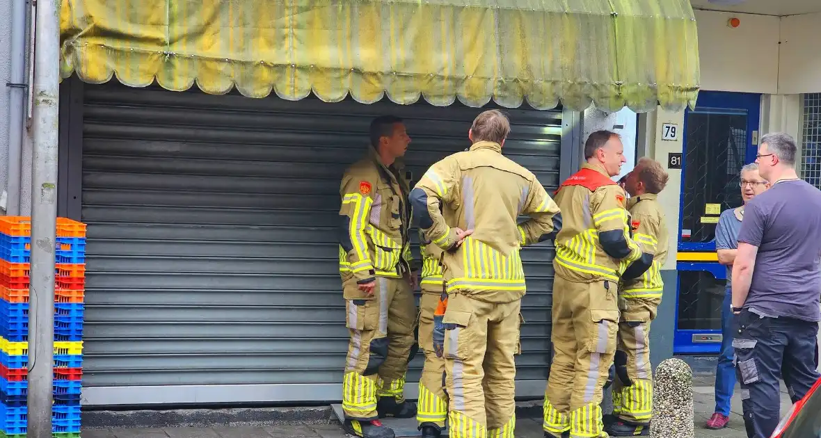 Brandweer forceert deur supermarkt - Foto 5