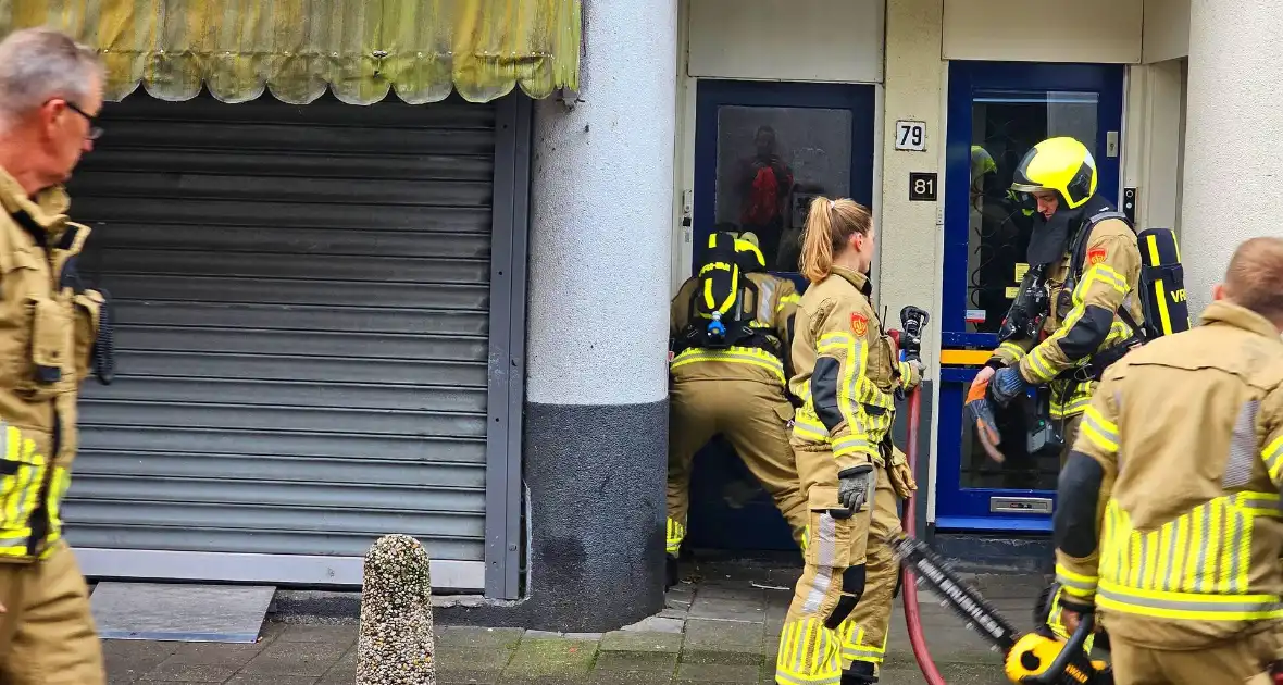 Brandweer forceert deur supermarkt - Foto 6