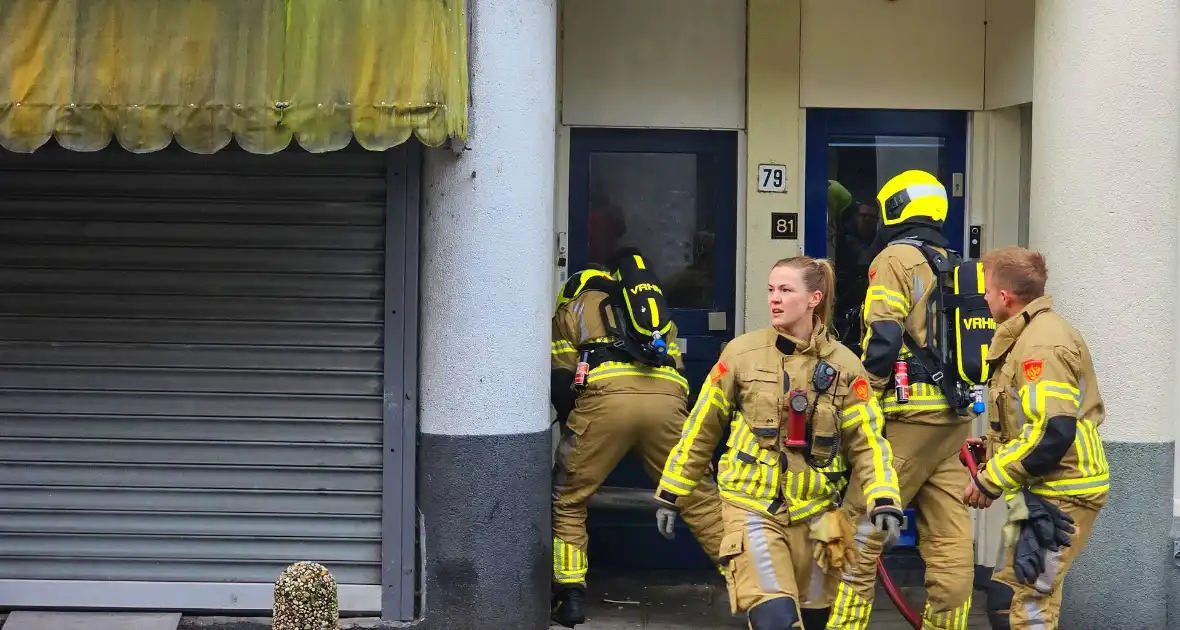 Brandweer forceert deur supermarkt - Foto 7