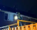 Brandweer weet kat uit dakgoot te pakken