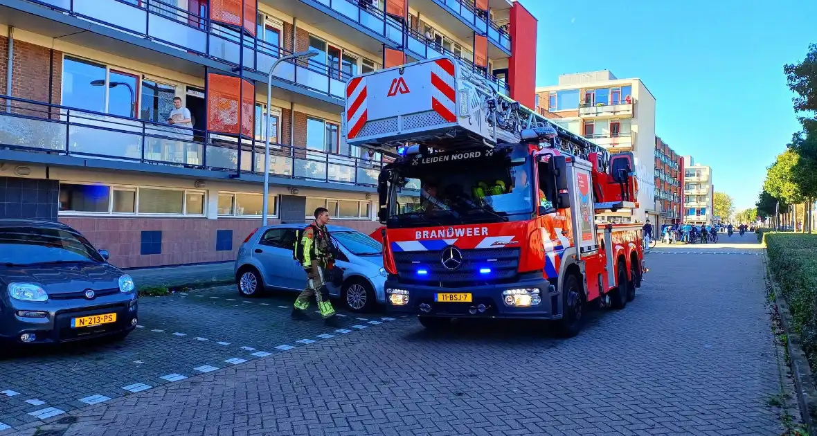 Vetpan zorgt voor brandmelding in flatwoning - Foto 1