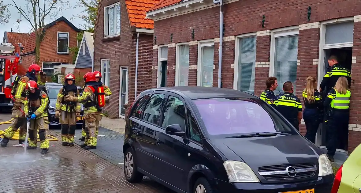 Bewoner probeert hulpdiensten te weren na brandmelding - Foto 2