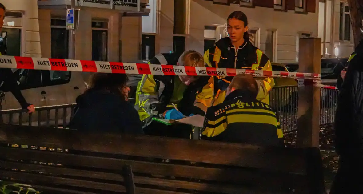 Vrouw en hond gered uit brandende woning - Foto 11