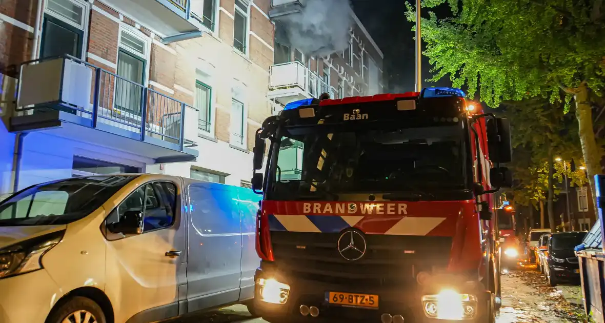 Vrouw en hond gered uit brandende woning - Foto 3