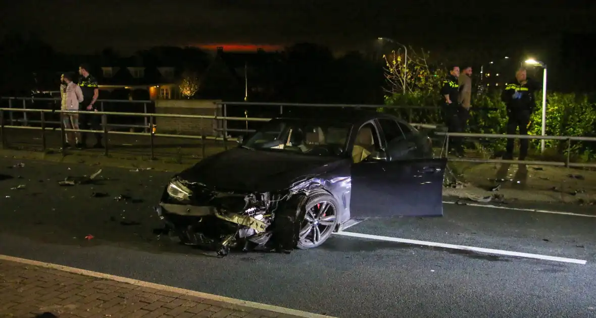 Vuurwapen aangetroffen bij flinke aanrijding - Foto 5