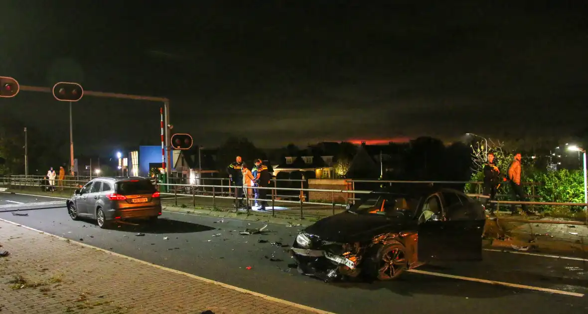 Vuurwapen aangetroffen bij flinke aanrijding - Foto 8