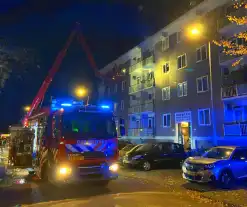 Veel rookontwikkeling bij brand in flatwoning