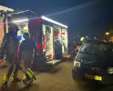 Brand achter woning door kortsluiting