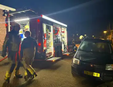 Brand achter woning door kortsluiting