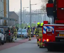 Specialistisch politieteam treft overleden persoon aan bij inval na flatbrand