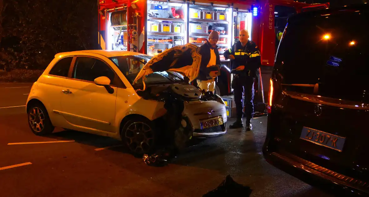 Taxichauffeur door brandweer uit bus bevrijdt - Foto 8