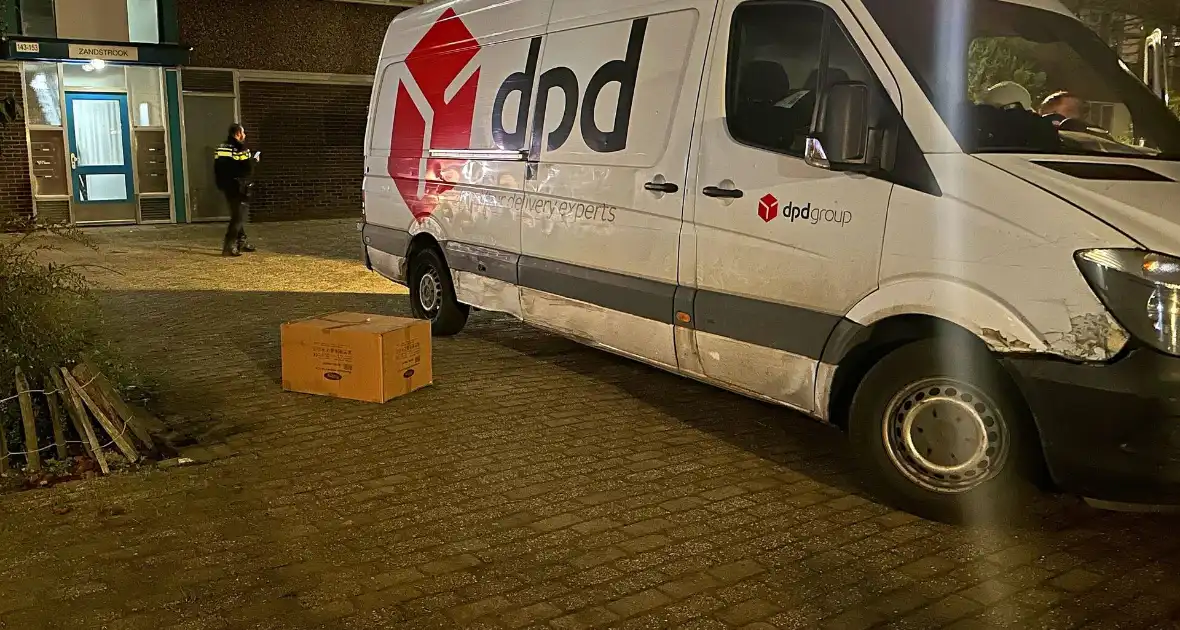 Pakketbezorger overvallen en ontvreemd van spullen - Foto 9