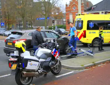 Scholier geschept door automobilist bij verkeerslicht