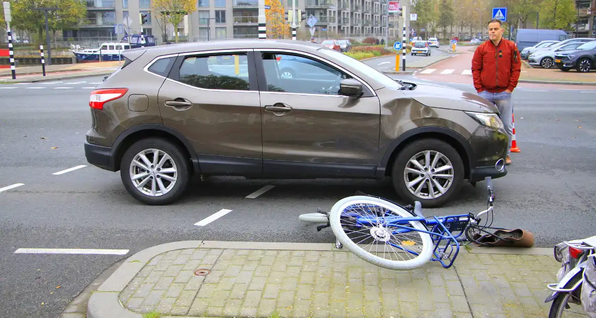 Scholier geschept door automobilist bij verkeerslicht - Foto 6