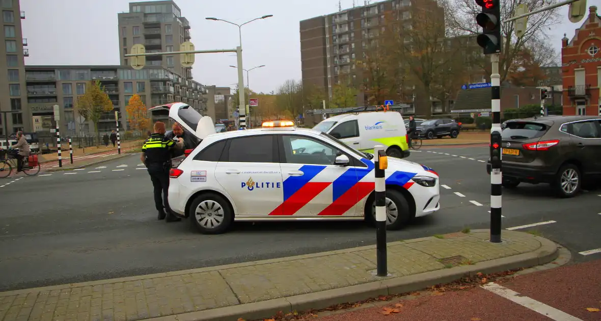 Scholier geschept door automobilist bij verkeerslicht - Foto 7