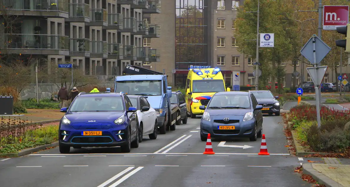 Scholier geschept door automobilist bij verkeerslicht - Foto 8