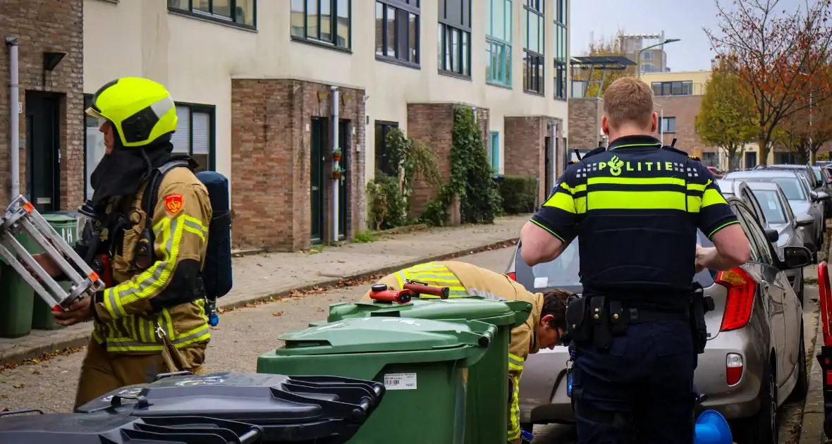 Brandweer sloopt keuken na brand in afzuigkap - Foto 11