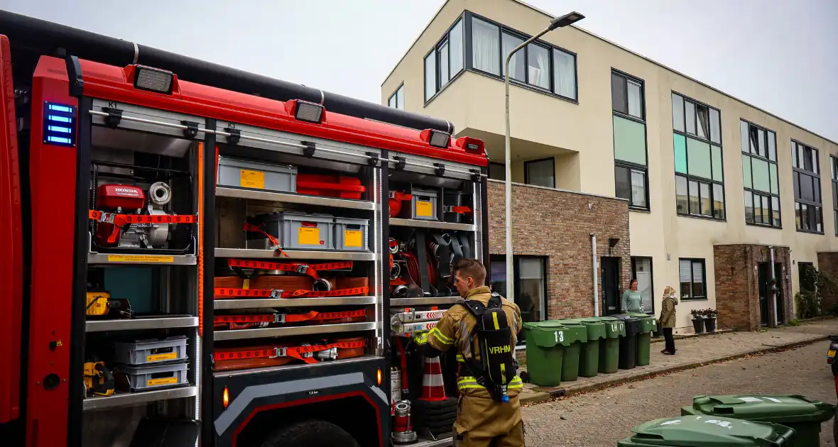 Brandweer sloopt keuken na brand in afzuigkap - Foto 12