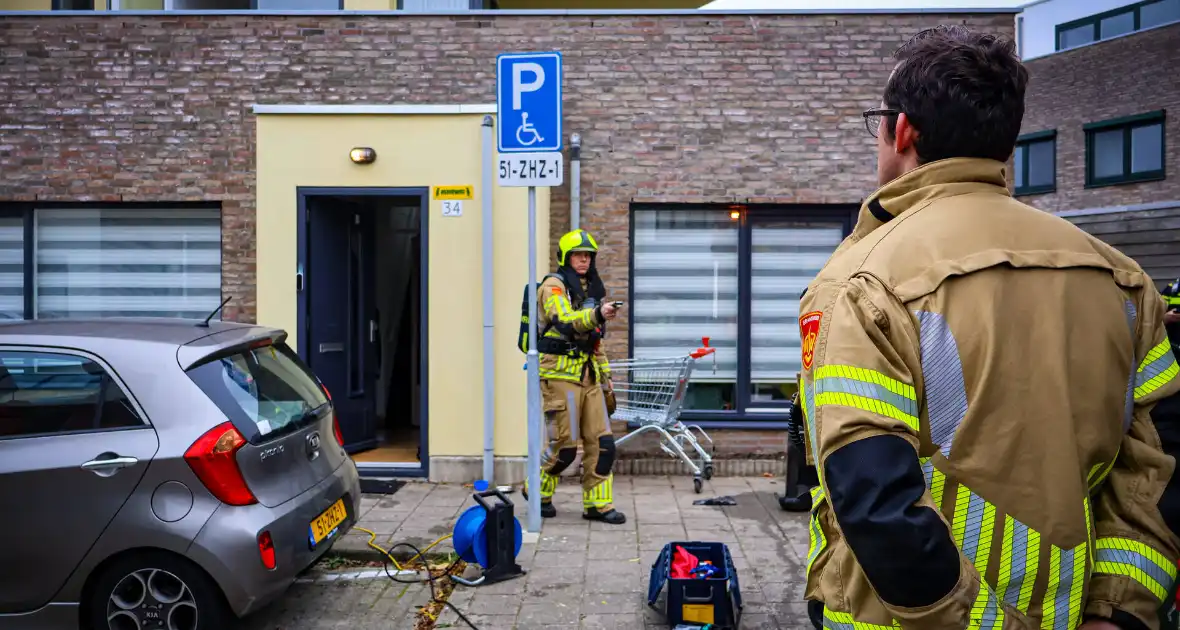 Brandweer sloopt keuken na brand in afzuigkap - Foto 5