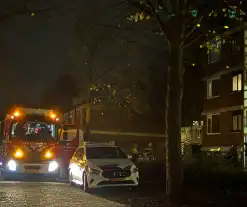 Brandweer controleert portiekwoning na brandmelding