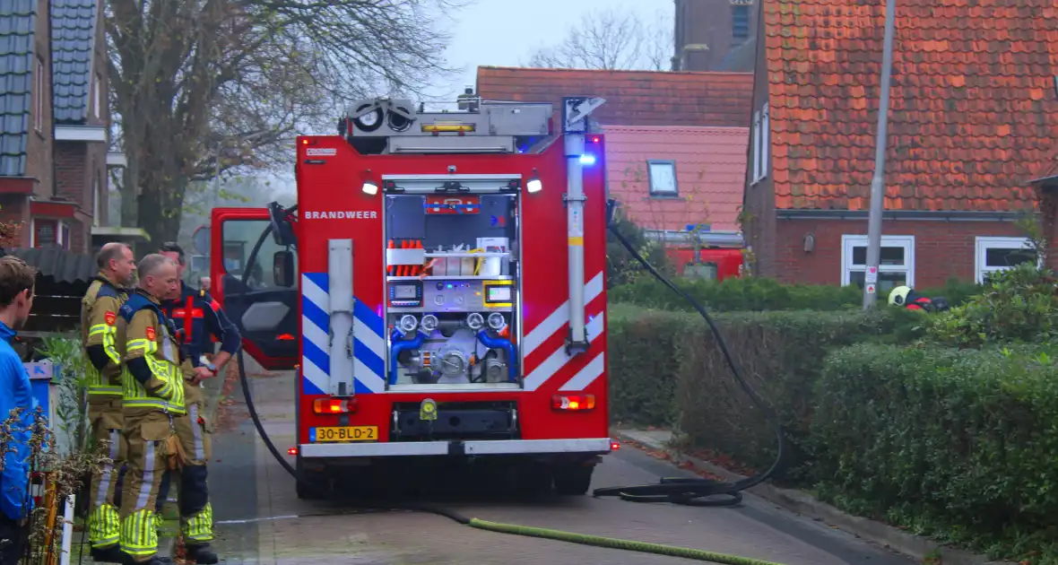 Flinke rookontwikkeling bij middelbrand in woning - Foto 3