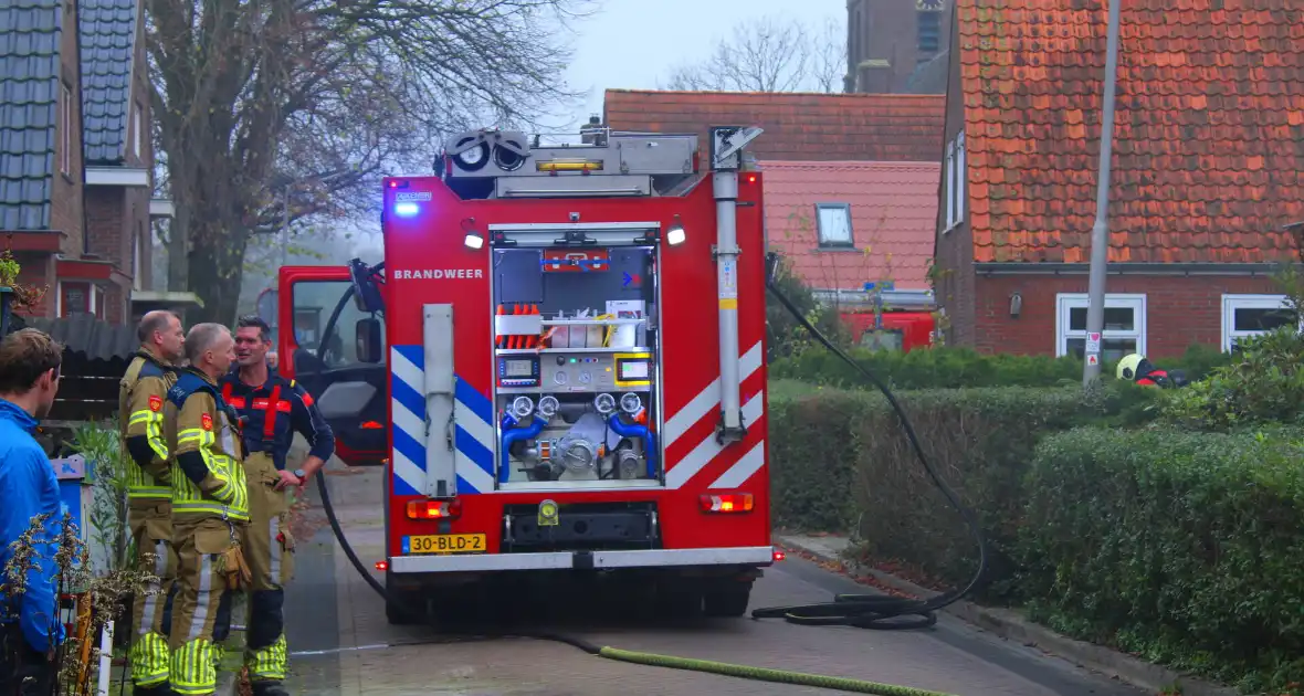 Flinke rookontwikkeling bij middelbrand in woning - Foto 4