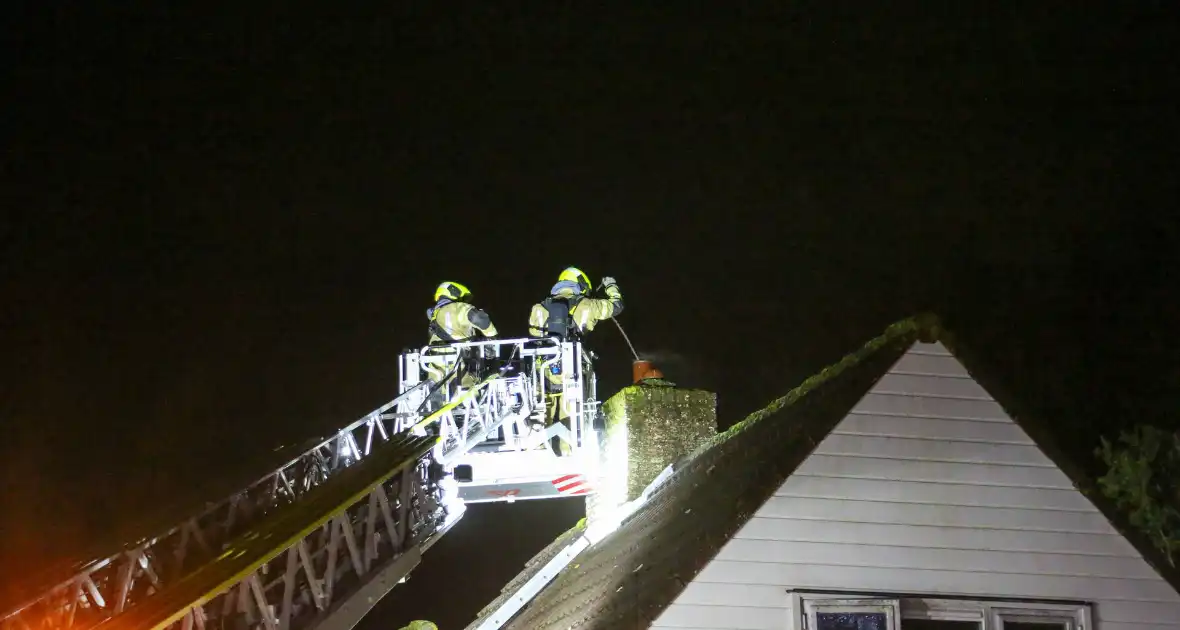 Brand in schoorsteen van woning op bungalowpark - Foto 7