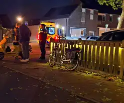 Fietser en scooterrijder komen in botsing