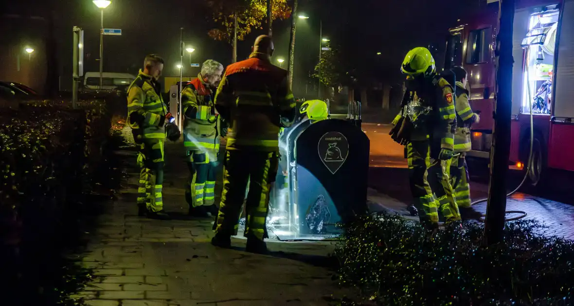 Brand in ondergrondse afvalcontainer - Foto 1