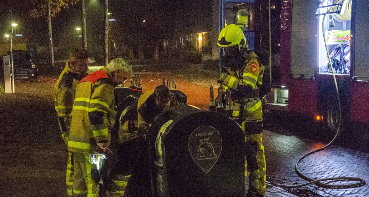 Brand in ondergrondse afvalcontainer - Foto 4