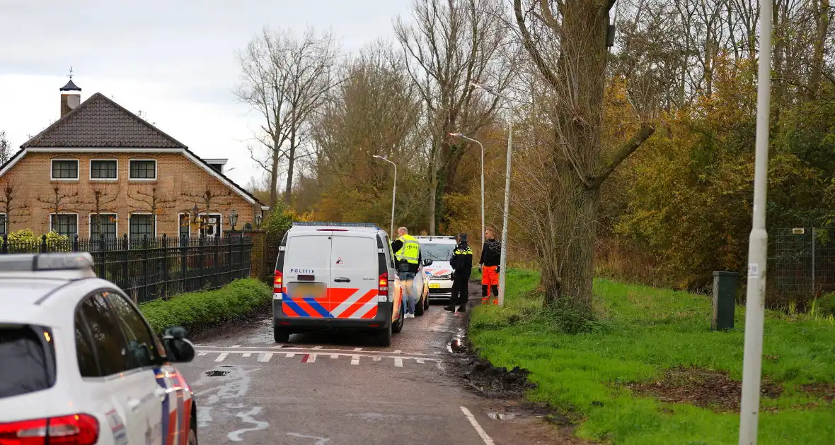 Telefoonwinkel overvallen door gewapende overvallers - Foto 6