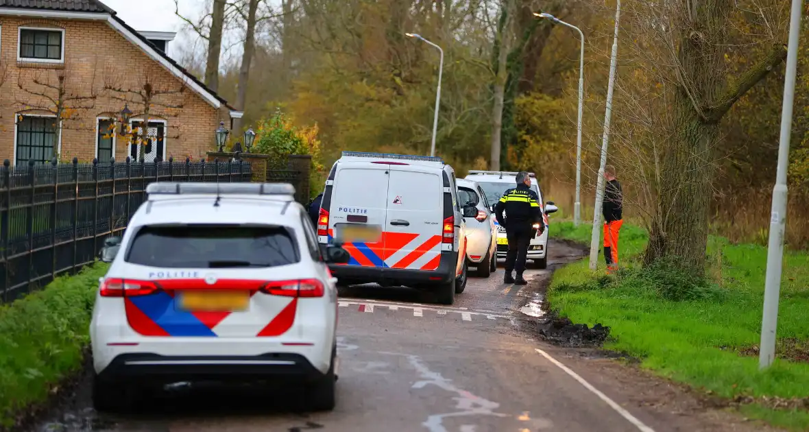 Telefoonwinkel overvallen door gewapende overvallers - Foto 8