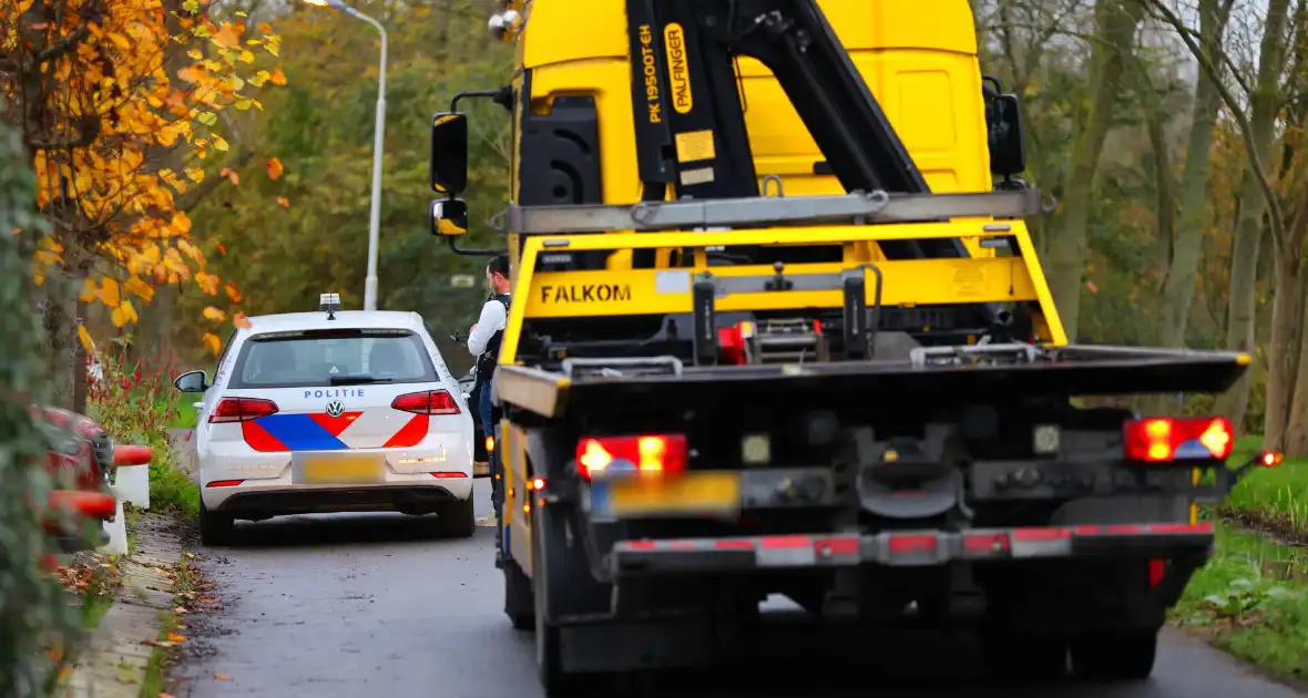 Telefoonwinkel overvallen door gewapende overvallers - Foto 9