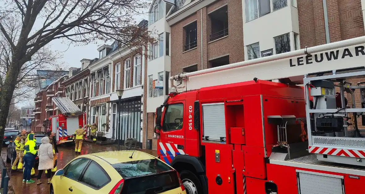 Brandweer redt duif die vast zit op balkon - Foto 1