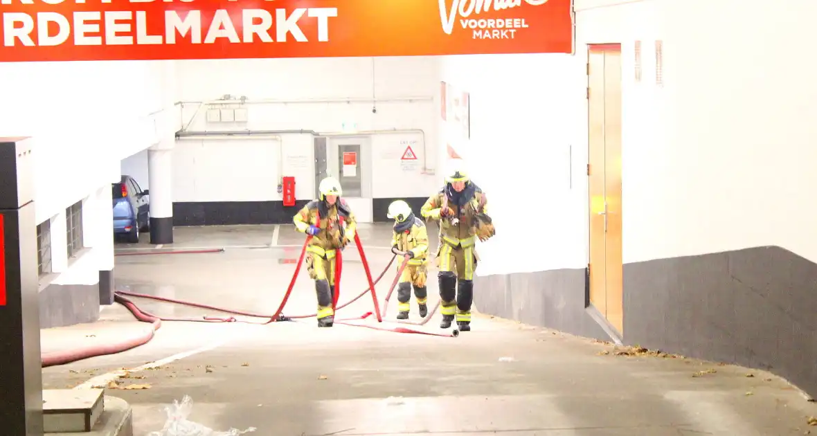 Brand in parkeergarage: aanzienlijke schade en evacuaties - Foto 5