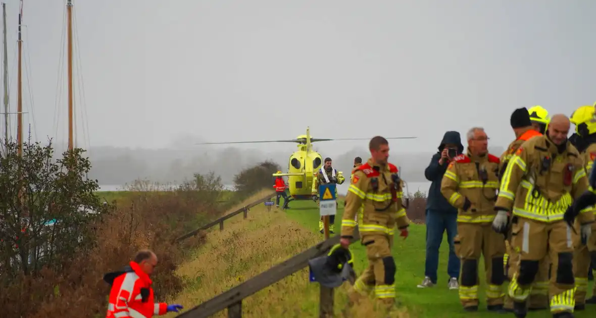 Overleden persoon aangetroffen na melding persoon te water - Foto 6