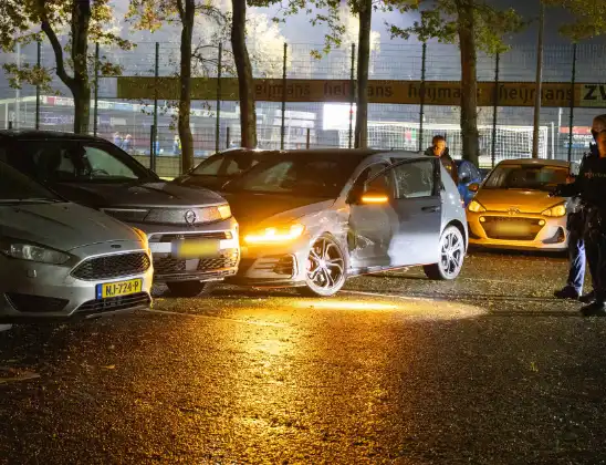 Vuurwapen gezien bij botsingen op parkeerterrein