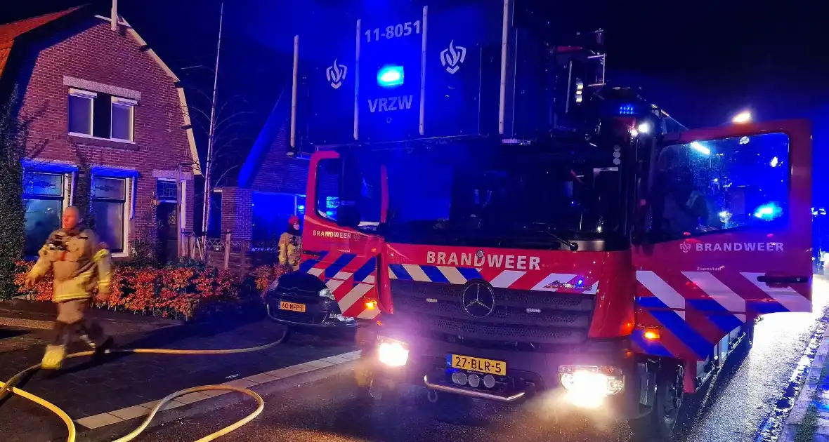 Oudere bewoner verlaat optijd brandende woning - Foto 4