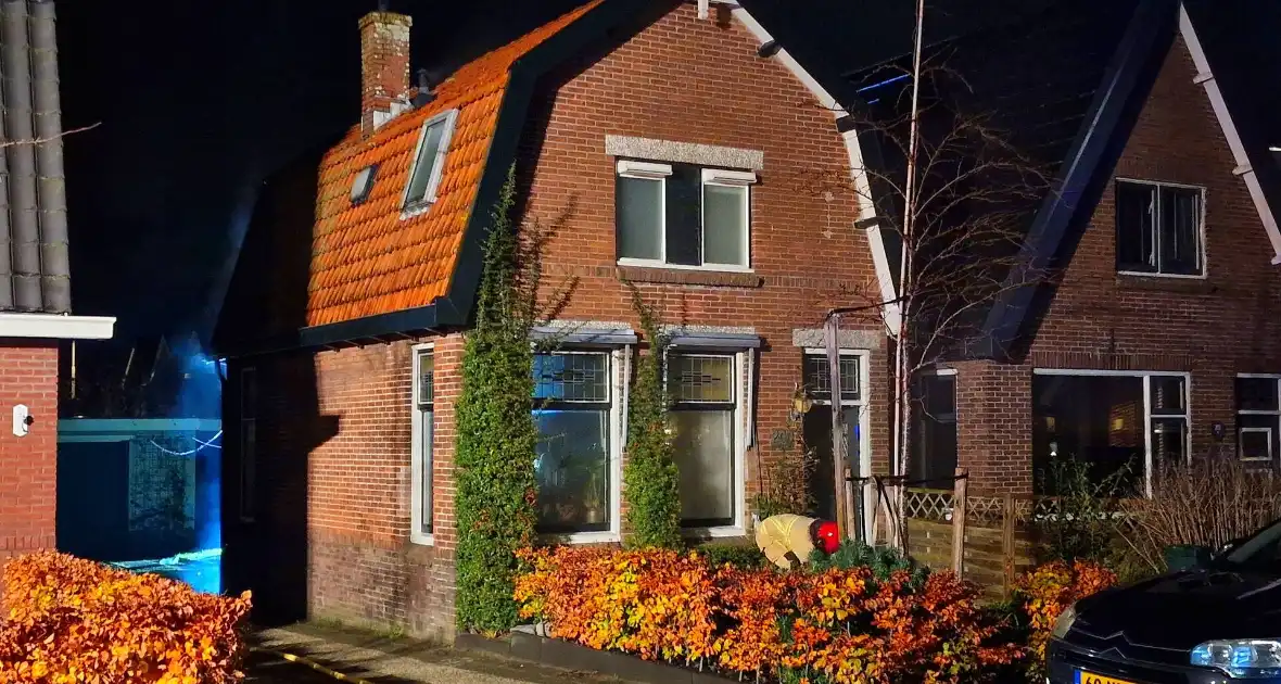 Oudere bewoner verlaat optijd brandende woning - Foto 5