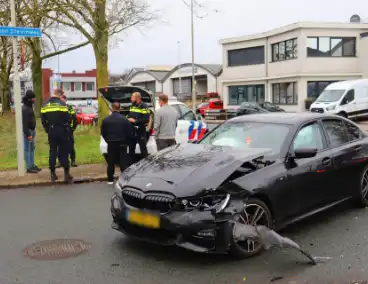 Forse schade na aanrijding op kruising