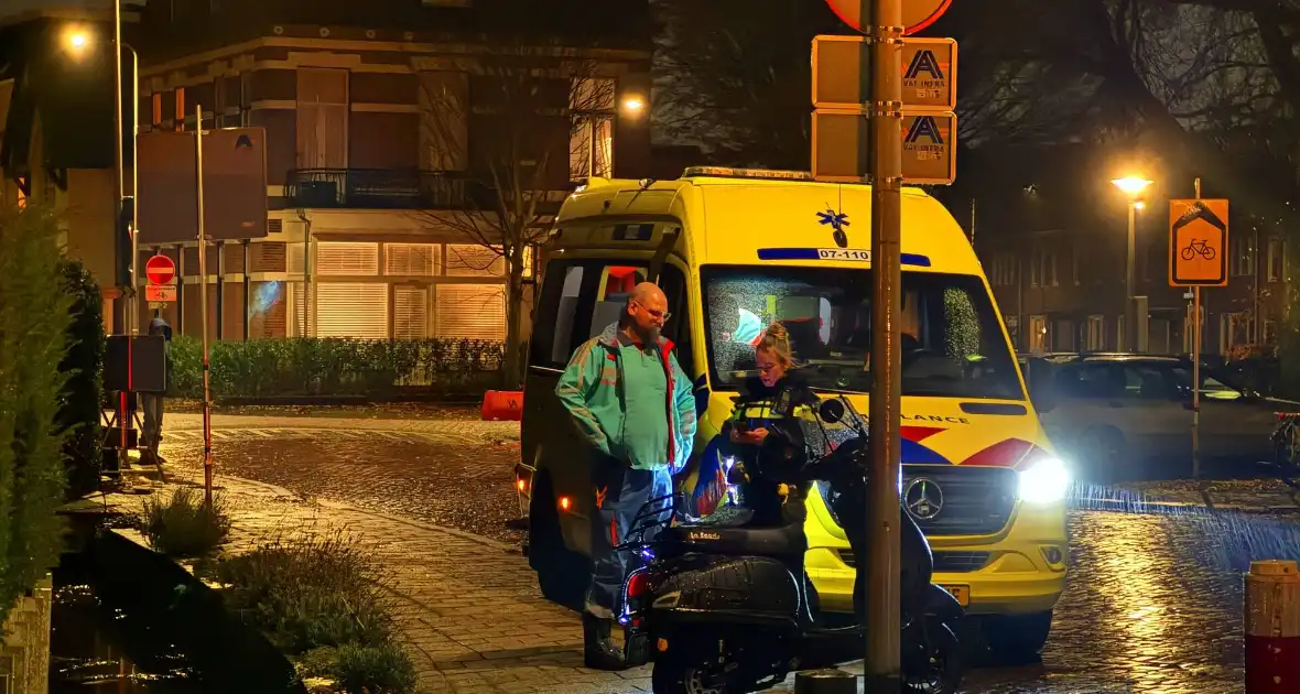 Scooterrijder glijd uit bij bussluis