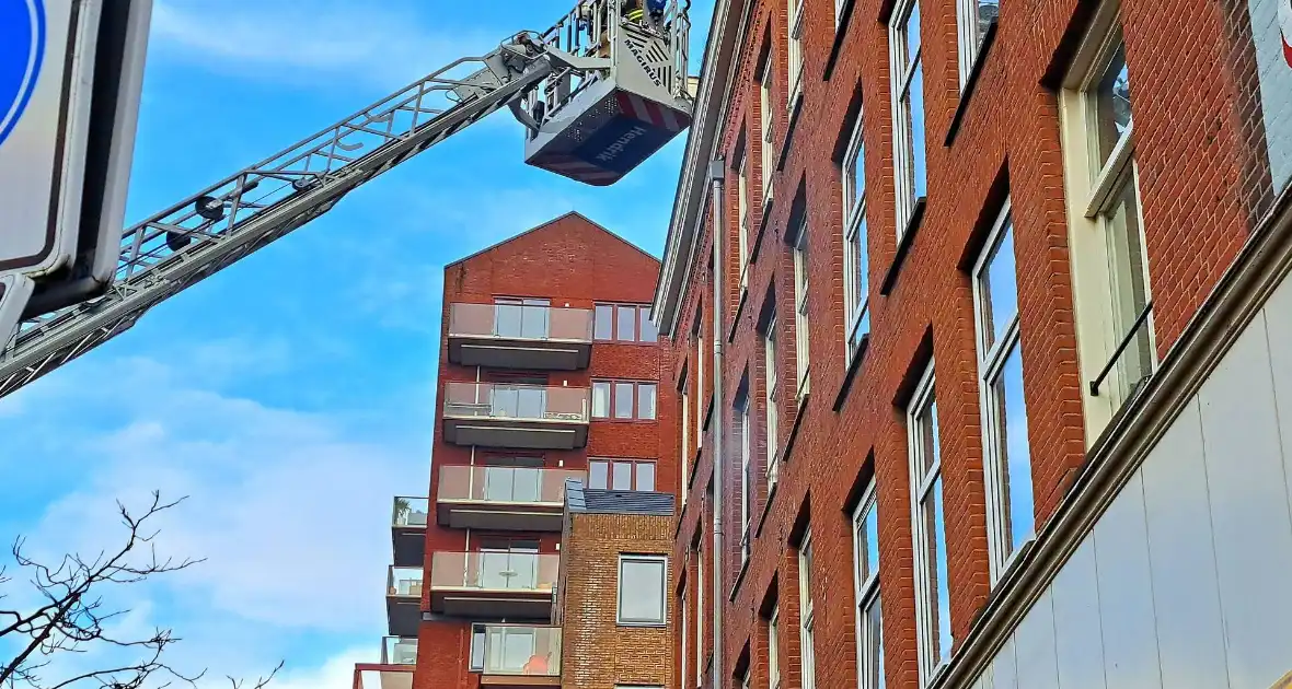 Veel rook bij brand in appartement - Foto 1