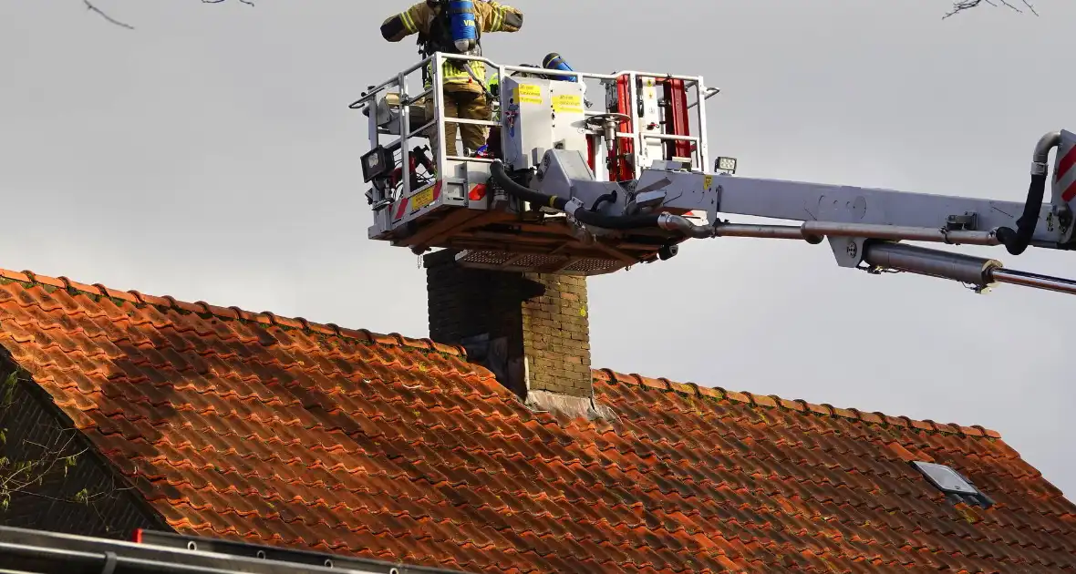 Schade aan woning beperkt na schoorsteenbrand - Foto 2